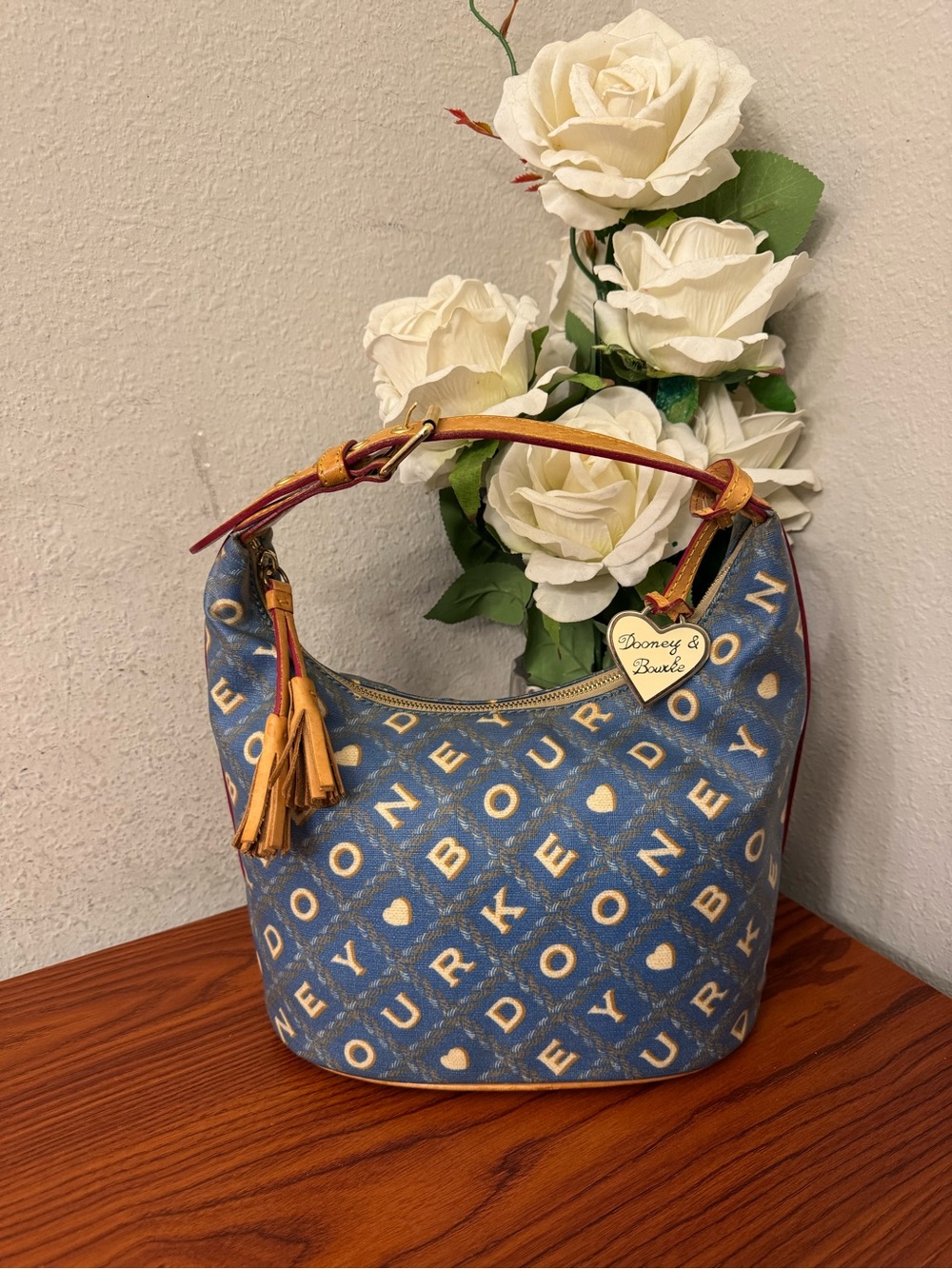 Dooney & Bourke Blue Monogram Bucket Bag with Tan Trim